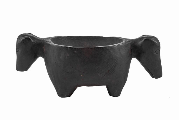 A black pot with animal heads isolated on the white background - Fotografie, Obrázek