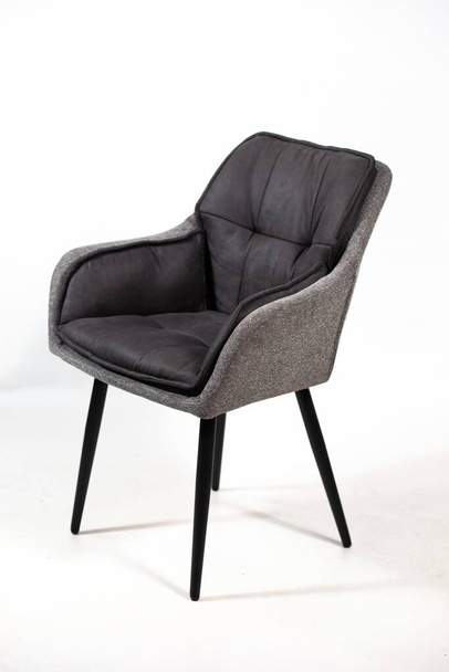 A beautiful shot of a modern black and grey chair isolated on a white background - Valokuva, kuva