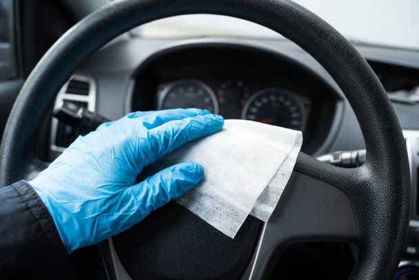 Cleaning Car With Sanitizer Wipe Against Virus Infection - Valokuva, kuva