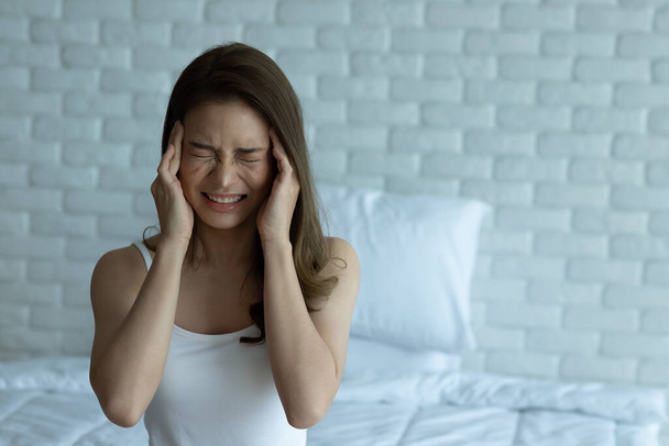 As mulheres têm dor de cabeça após o exercício
. - Foto, Imagem