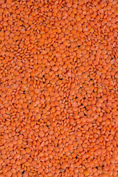 Textura vertical de lentilhas de laranja secas
. - Foto, Imagem