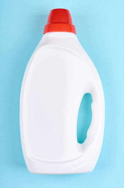 White detergent bottle, washing soap, cleaning gel. Flat lay, overhead view image. - Foto, imagen