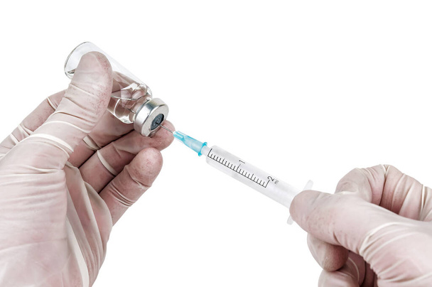 doctor prepares medicine in syringe isolated on white - Фото, изображение