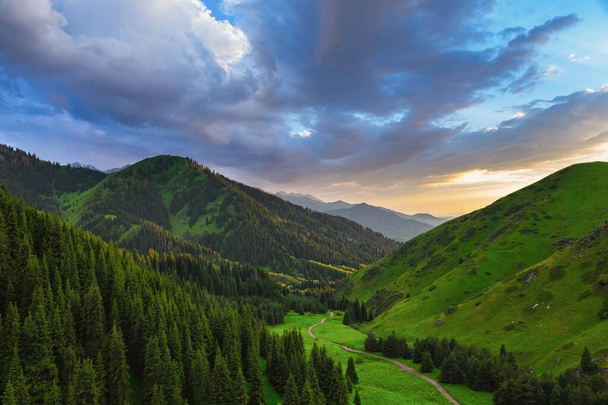 Mountain landscape. Colorful evening in the mountains in summer. Tien Shan mountains. Kazakhstan - Photo, Image
