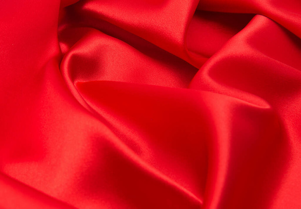 red satin or silk fabric as background - Фото, изображение