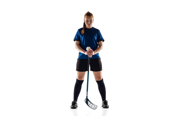 Floorball female player isolated on white studio background, action and motion concept - Foto, imagen