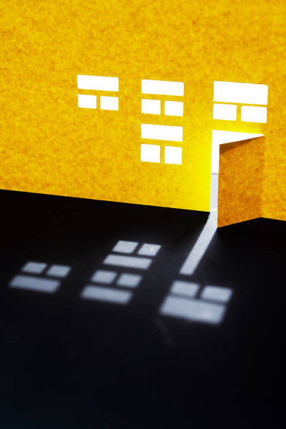 Composition découpe du papier. Maison jaune avec fenêtres éclatantes et porte ouverte
 - Photo, image