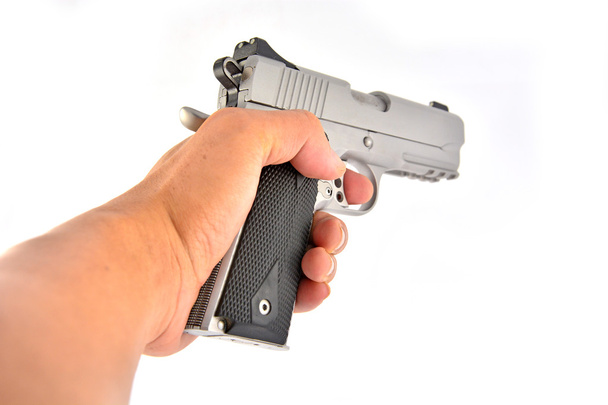 hand holding gun - Photo, Image
