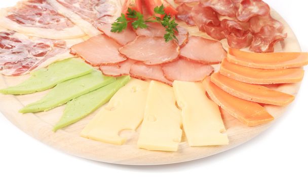Various cheese on wooden platter. - Foto, imagen