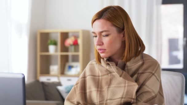 sick woman having video call on laptop at home - Metraje, vídeo