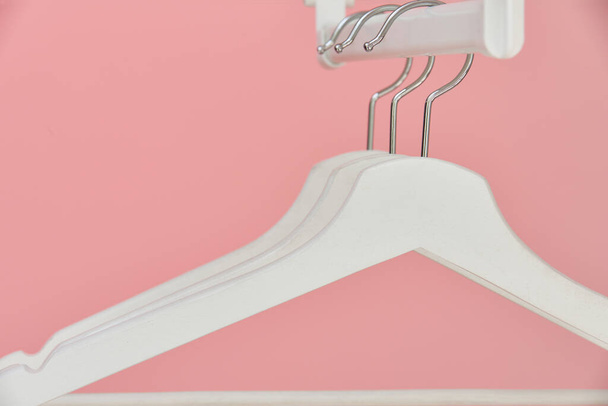 coat hanger for clothes pink background - Fotoğraf, Görsel