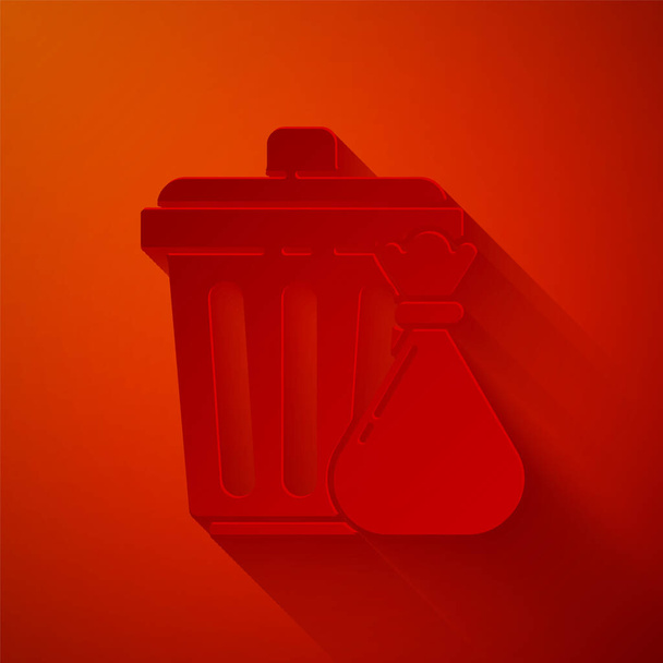 Бумага вырезать мусорный бак и мешок для мусора значок изолирован на красном фоне. Знак мусорного бака. Reycle basket icon. Значок офисного мусора. Бумажный стиль. Векторная миграция - Вектор,изображение