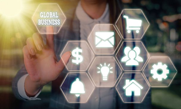 Écriture manuscrite de texte Global Business. Concept signifiant Commerce et système d'affaires une entreprise faisant à travers le monde
. - Photo, image