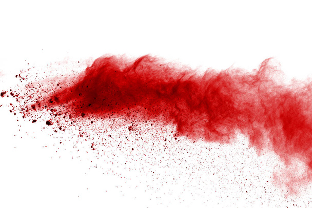 Rotes Pulver explodiert auf weißem Hintergrund. Farbige Wolke. Bunter Staub explodiert. Holi bemalen. - Foto, Bild