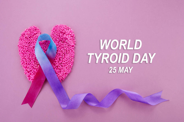 World Thyroid day background. Teal, pink and blue ribbon. - 写真・画像