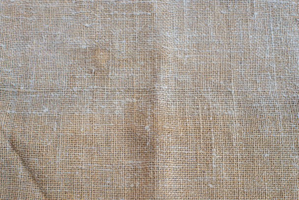textuur van oude ruwe beige jute - Foto, afbeelding