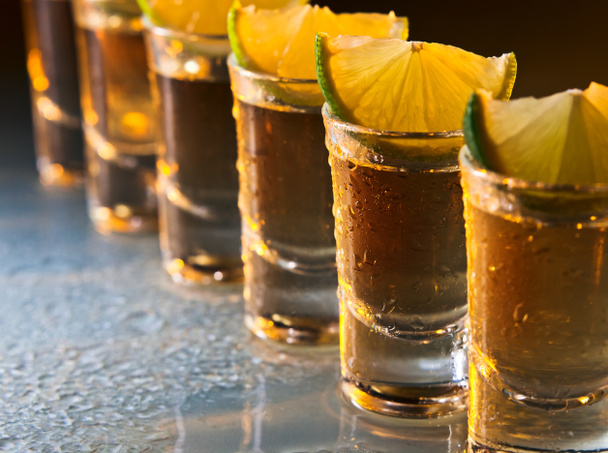 tequila and lime on glass table - Photo, Image