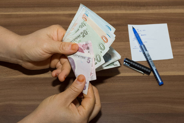 Turkish lira, cash money photos. news photos. - Foto, afbeelding