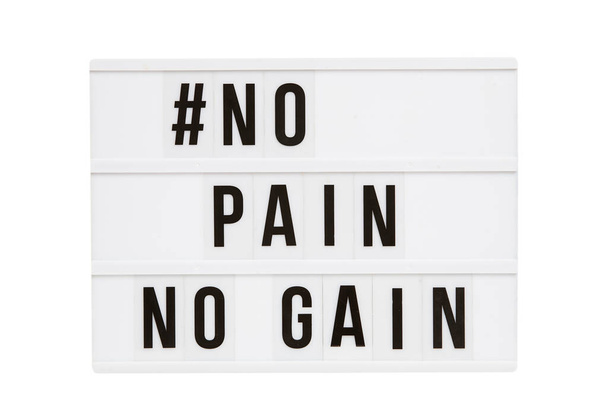 Το hashtag 'No Pain No Gain' γραμμένο στο κουτί με τα φώτα σβηστά - Φωτογραφία, εικόνα