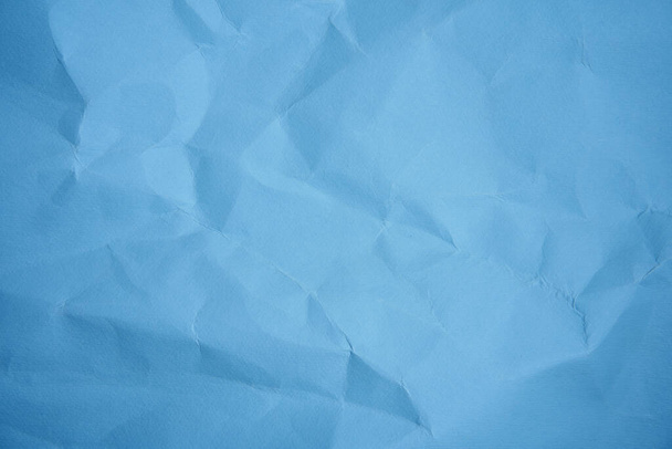 Blue Sheet crumpled paper color background  Close up Copy space for text - Foto, imagen