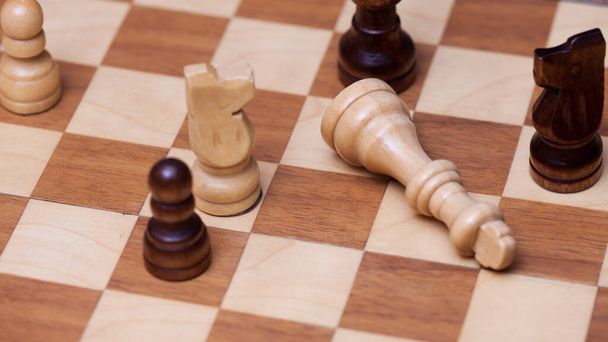 Chess game, check or checkmate, cut a figure, the concept of competition in business - Foto, imagen
