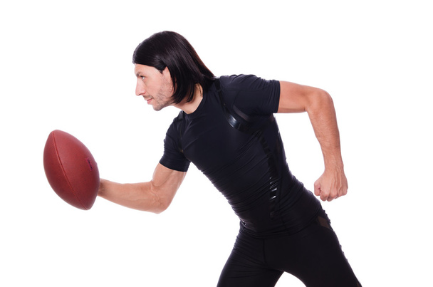 Man training with american football on white - Foto, immagini