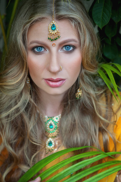 beauty european blonde girl in indian yellow saree - Фото, зображення