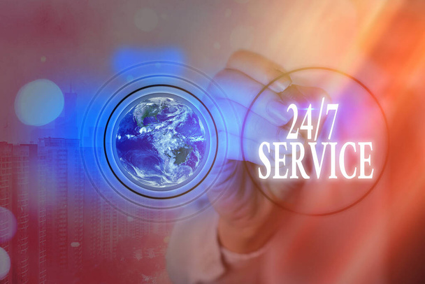 Writing note showing 24 Or 7 Service. Business photo showcasing Always available to serve Runs constantly without disruption Elements of this image furnished by NASA. - Photo, Image