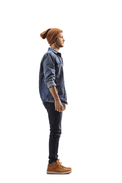 Full length profile shot of a guy standing isolated on white background - Φωτογραφία, εικόνα