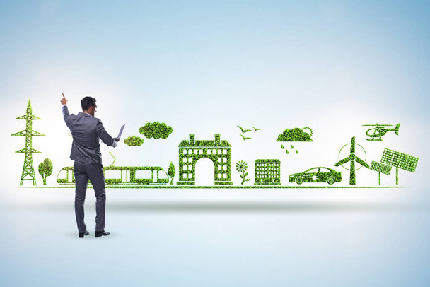 Businessman in green and environmental concept - Photo, Image