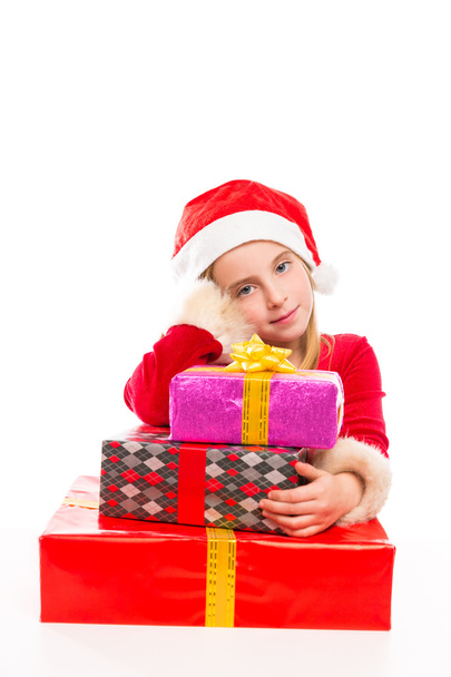 Christmas Santa kid girl happy excited with ribbon gifts - 写真・画像