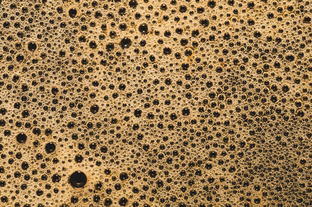 Coffee foam with bubbles macro texture. froth drink background - Φωτογραφία, εικόνα