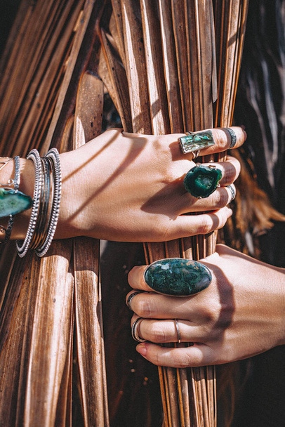 close up of woman hands with with gem stones accessories outdoors - Φωτογραφία, εικόνα