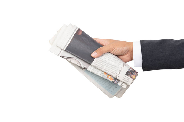 A businessman holding a newspaper on isolated background and clipping path - Photo, image
