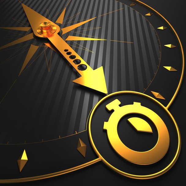 Icono de cronómetro dorado en brújula negra
. - Foto, Imagen