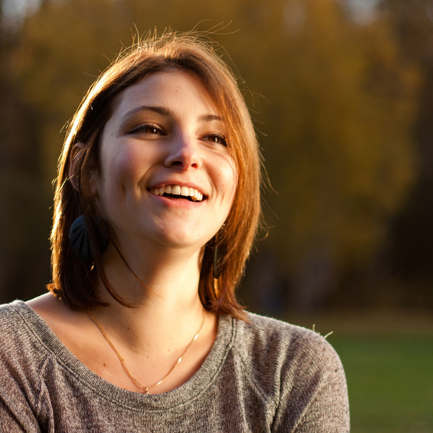 Portrait Of Young Smiling Beautiful Woman - Foto, immagini