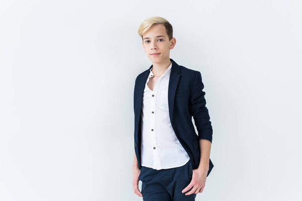 Puberty concept - Teenage boy portrait on a white background with copyspace. - Fotografie, Obrázek