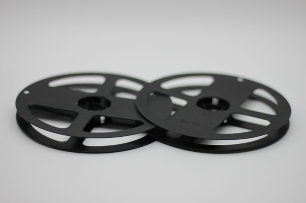 чорні рулони для фільмів на білому тлі
 - Фото, зображення