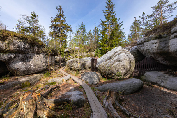 Stolowe Mountains National Park. Wooden boardwalk in Rock Labyrinth hiking trail Bledne Skaly near Kudowa-Zdroj, Lower Silesia, Poland.  - Photo, Image