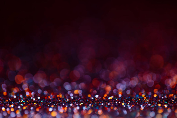 Decoration bokeh glitters background, abstract shiny backdrop with circles,modern design wallpaper with sparkling glimmers. Purple, red, golden and black backdrop glittering sparks with glow effect. - Fotó, kép