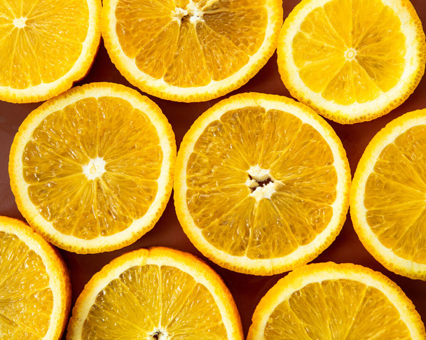 szeletek lédús narancs háttér, textúra, közelkép - Fotó, kép