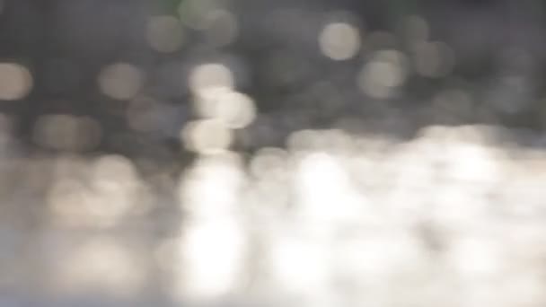 Grau glitzernde Lichter, defokussierte Lichtreflexionen Bokeh Hintergrund - Filmmaterial, Video