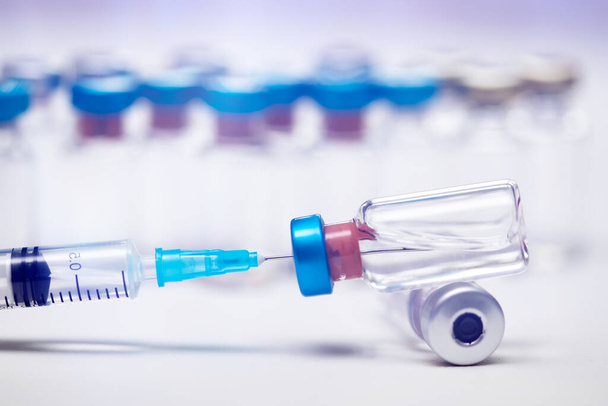 Vaccine and syringe injection for prevention, immunization and treatment of coronavirus infection (COVID-19, nCoV 2019) - Φωτογραφία, εικόνα