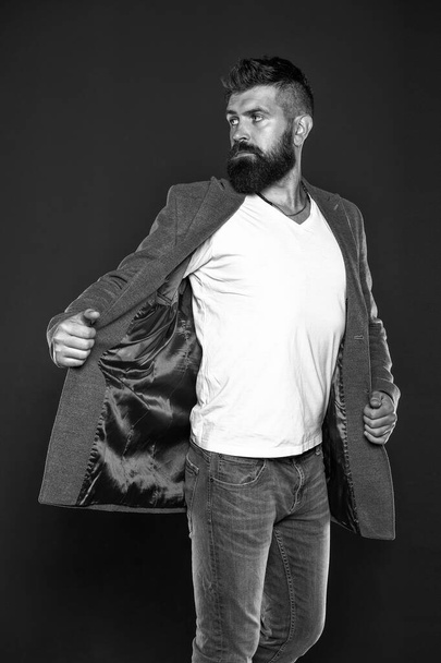 Adding fashionable touch. Fashionable man grey background. Fashionable look of vogue model. Bearded man wear fashionable casual outfit. Fashion and style trends, vintage filter - Valokuva, kuva