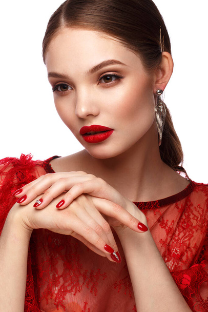 Beautiful girl in red dress with classic make-up and red manicure. Beauty face. - Fotografie, Obrázek