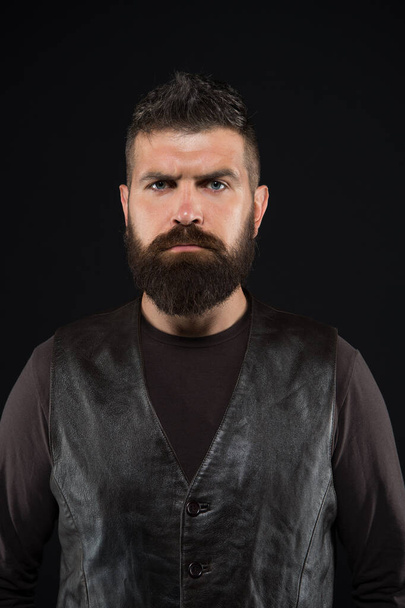 Confident and stylish. Serious hipster dark background. Bearded man in trendy hipster style. Brutal man with hupster hair. Fashion barbershop. Beard barber. Grooming habit. Hipster lifestyle - Foto, Imagem