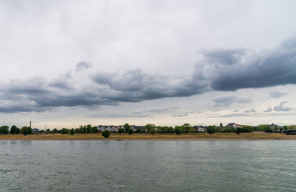 View at Oberkassel neighborhood and Rhine river in Dusseldorf, Germany. - Fotoğraf, Görsel