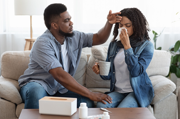 Loving African Husband Caring About His Sick Wife At Home - Zdjęcie, obraz