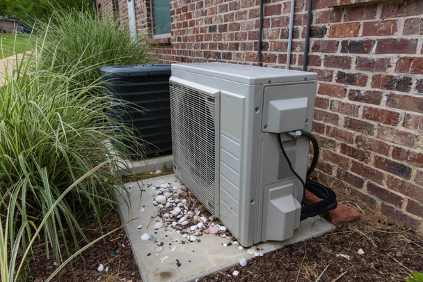 HVAC Air Conditioner Compressor and a Mini-split system together - Photo, Image