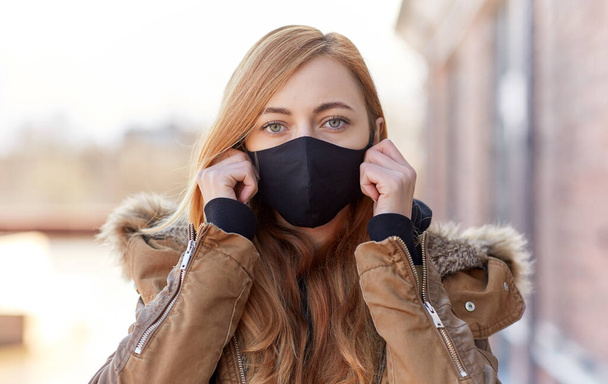 woman wearing protective reusable barrier mask - Fotoğraf, Görsel